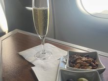 Starting with bubbles, nut, and pretty good quality marinated olives
