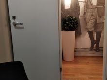 On the left after entering the room there was a space for depositing bags along with a large wardrobe, with a door leading through to a separate small chamber with this photo imprinted on the wall