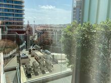 View from the bedroom, the balcony spreads out to the double deckchair (seen on the left)