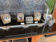 Cereals  & Milk in the uncooled jugs to the left