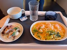 The shrimp tagliatelle. Very saucy (which I like) but quite ok for a seafood plane meal.
Dessert was a bun filled with vanilla cream
