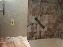 Bathroom with tub-shower combo.