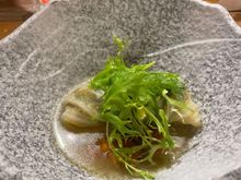 Mushroom cabbage rolls with a vegetable consomme