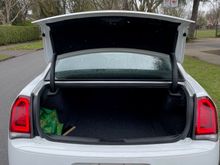 Trunk -- the S has an Alpine Subwoofer in the trunk that the standard 300 does not have 
