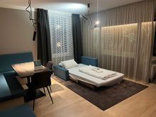 Urban Suite - living room made up into a bed (note - there is not a proper door separating this area from the bedroom, only a thin curtain)