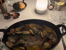 Whole fish with shellfish….lemon heavy with white wine,….delicious and light.