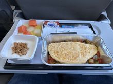 LGW-MAD on Iberia Express. This is the morning(ish) departure so breakfast. Omelette was actually pretty good and yoghurt was decent as well. Two rounds of drinks were offered after that the entire crew- c. 5 cabin crew and one of the pilots sat/stood in the front galley for about half the flight which was a bit odd. 