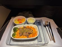 Pre-arrival Korean meal of beef with kimchee fried rice