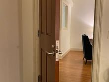 Door between bedroom and living room