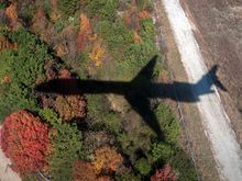 Something we won't see very much longer. The shadow of a MD88 on approach to ATL coming from HSV. Tail # N994DL