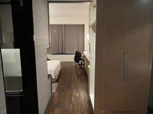 This is the entryway with the closet on the right side and bathroom / shower alcove to the left.