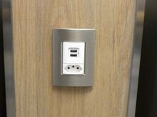 power plugs and USB charging ports at every seat. Note the absence of a socket suitable for US plugs