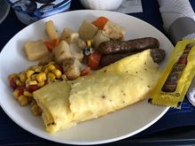 the omelet was moist with a yummy filling. The hot sauce a nice touch.