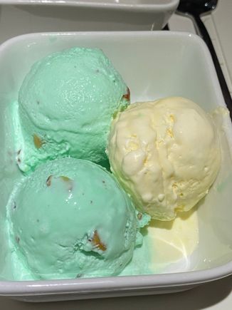 Sweet Bites - two scoops of pistachio ice cream and one scoop of vanilla ice cream.