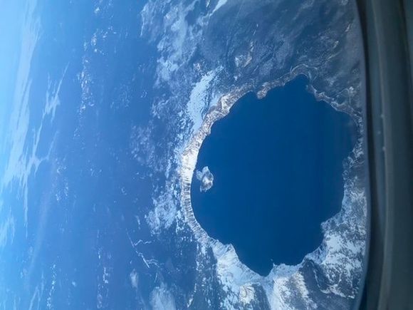 Don’t know how to flip, but Crater Lake, SMF-SEA on 12/4.


