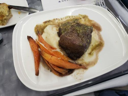 Braised Short Rib with horseradish potato puree, roasted rosemary carrots, salsa verde, and red wine sauce