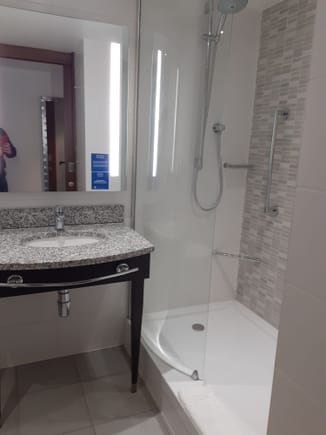 Sink & towel rail  with shower. Wall mounted soap etc