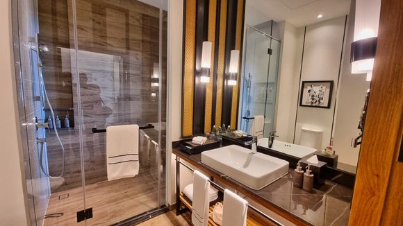 Level Premium bathroom - Spacious and feels quite luxurious, especially the very large shower. One wall of the shower is glass, looking into the bedroom. Makes it feel very spacious.