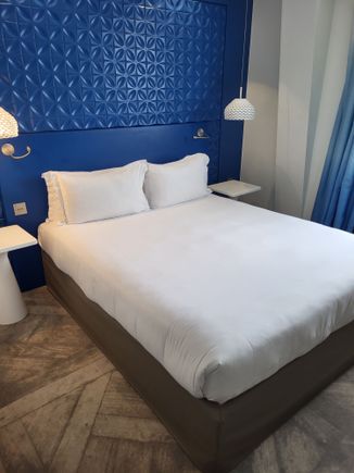 The room, with enough space on each side for a small stand, with power plugs on each side. 