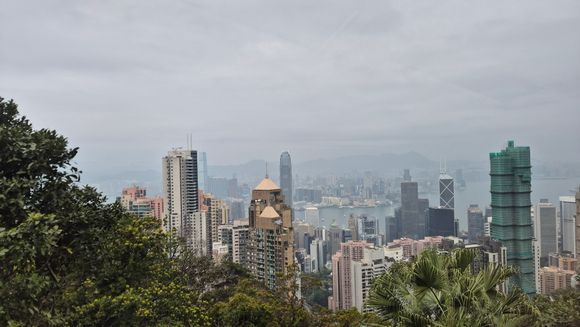 Riding the Peak Tram. Octopus card gives you priority. Strangely, large numbers of people were queuing to buy regular tickets. What is that, I don't understand, just embrace the octopus. 