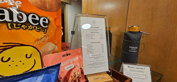 Mini bar price list.
Squashable bottle for sale, around £6.