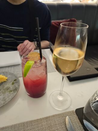 Drinks! Taittinger Brut Reserve champagne, plus a sakura mocktail for my friend