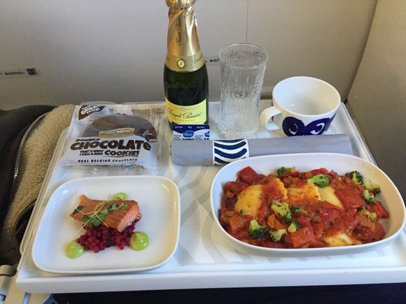 Avocado tortellini for main, but excellent head of cabin lady on this flight again. Busy business class, almost 50 passengers