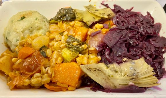 Winter vegetable and farro hotpot, herb dumpling, braised red cabbage