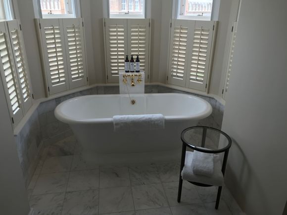 Blinds can be opened for view / tub can hold 2