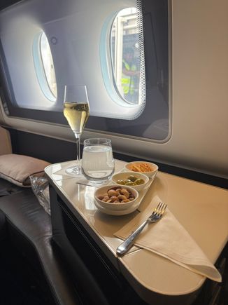 Pre-departure beverage and nibbles 