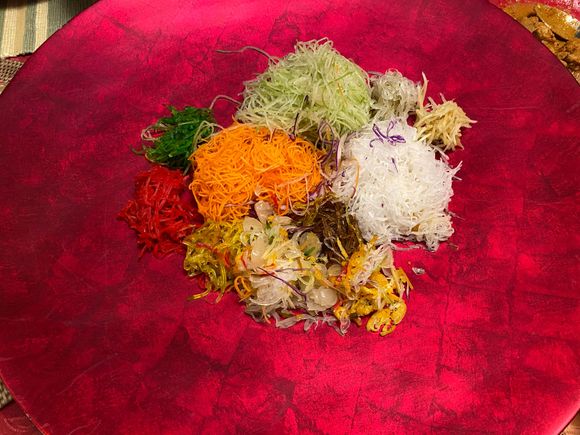 Vegetarian yusheng before  adding the crackers , fried fish skin and abalone mushrooms 