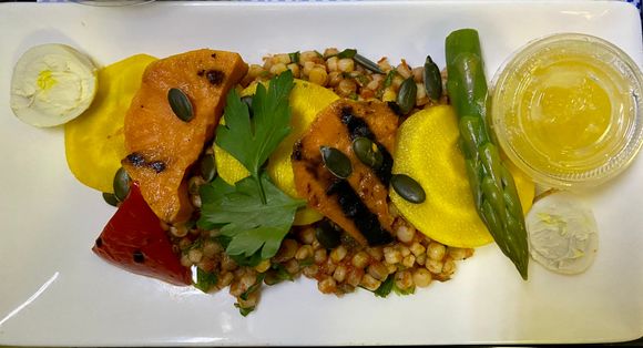 Tomato fregula with charred sweet potato, roasted pepper, asparagus, golden beetroot, quail’s egg, lemon dressing