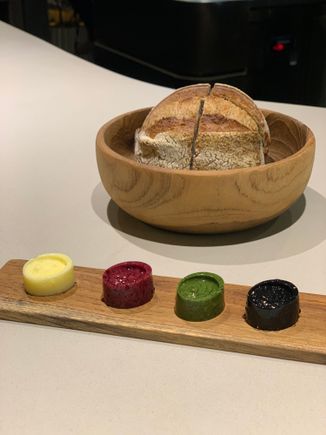 Sourdough bread, salted, beetroot, spinach and charcoal butters