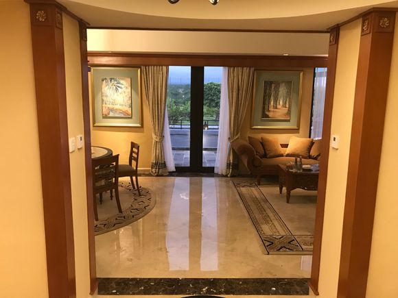 When you enter, 
Crossroads with Hecate
Left to master bedroom with King bed
Right to bedroom with Twin beds
Through, you get into the living room 