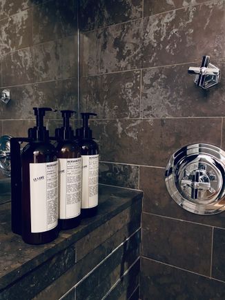 Full size Le Labo in the shower/tub “room”