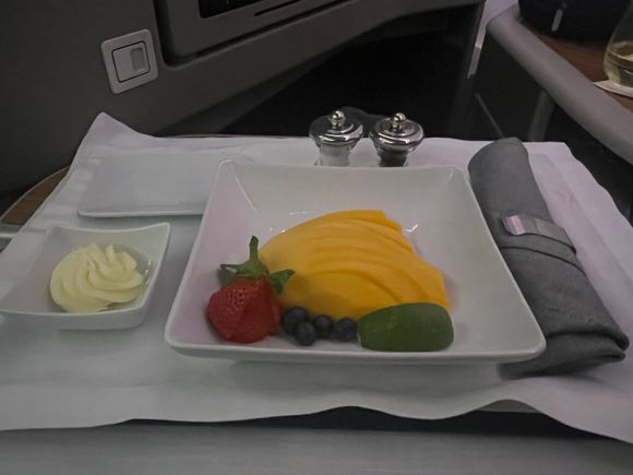 Standard fruit offering. Multiple rounds of the breadbasket were offered. 

One thing to note — all of the trays / juices were placed on the 1A/F ledges for distribution vs. the galley. I’d be less-than-thrilled if I was in row 1. 