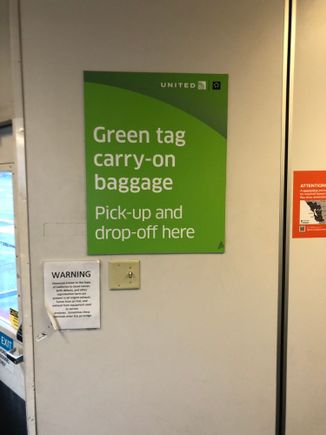 Waiting for my Green Tag bag. 