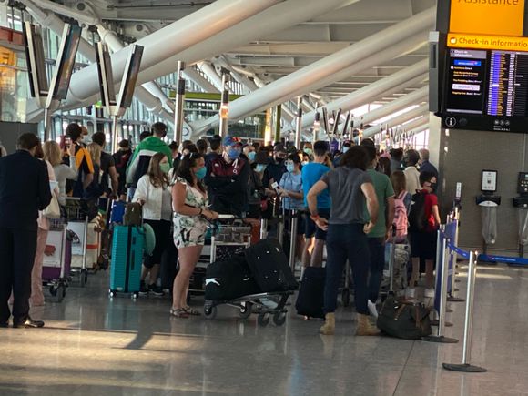 1 hour plus business class queues with no social distancing