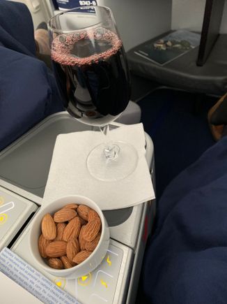Drink was served on glass and the almond was not cold (not hot, either). Quality of wines was higher than United.