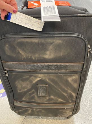 Condition of suitcase on arrival in New York of one suitcase. 