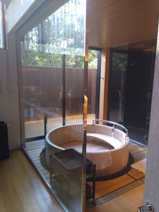 Rest of the circular tub. Shower is to the right.
