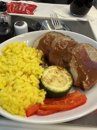 Veal osso buco. Sounded great on the menu. Tasted like cardboard. This ranks as one of the worst entrees in J ever.

Champagne was readily available on this flight as well as a YUL-FCO flight on Oct 25th.