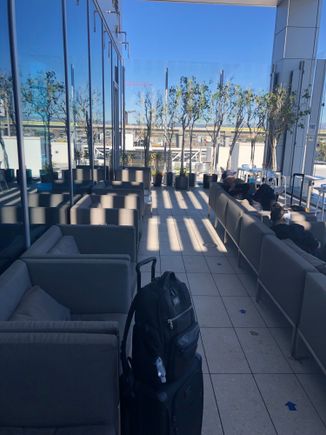 

I had about an hour to kill prior to my flight so I set up shop on the outdoor terrace where the air was fresh and temperature at 77 degrees. 
