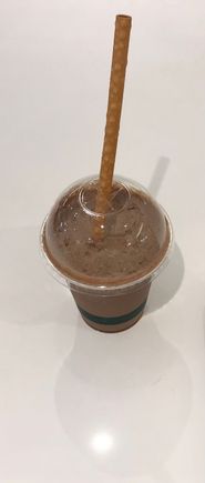 Dark chocolate sorbet almond milkshake with whole meal edible straw 