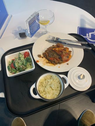 Israeli salad, moussaka, garlic herbed rice