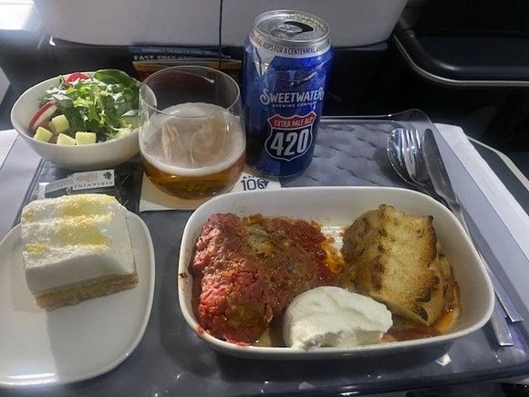 DCA - SLC: Jon & Vinny's meatballs - first time trying the J&V branded meatballs and these can't be the same ones that are served on the LA flights. I swear that they look just like the frozen meatballs from Safeway. Beside that disappointment, the bread was placed into the sauce when heated so both pieces were soggy and inedible. Won't be ordering this again (at least out of DCA).