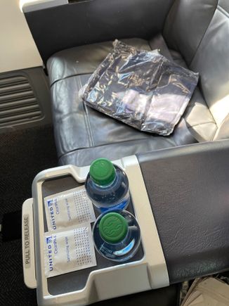 Saw this on my United flight today ... it is truly amazing how the roles have reversed, and now you see Dasani mini bottles, a sanitizing wipe and a blanket at your seat in F... it’s like it was March 2019 on Delta...and now on Delta there are no Dasani mini bottles and no blankets!
