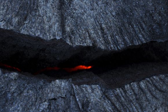 Lava was flowing just a few feet below my feet.