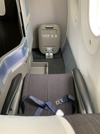 This seat gets a lot of ’stick’ but I actually like it. Apart from staring at someone in the face (takeoff & landing) I like all aspects of the seat, very comfortable.