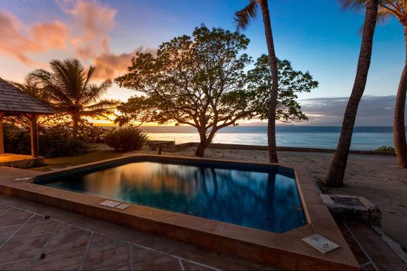 Beachside Pool Villa at sunset